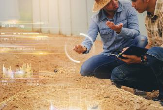 Farmer and agronomist discuss how to improve soil quality.