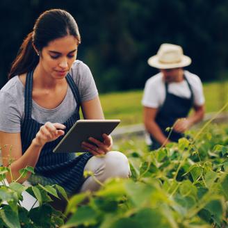 woman farmer on tablet