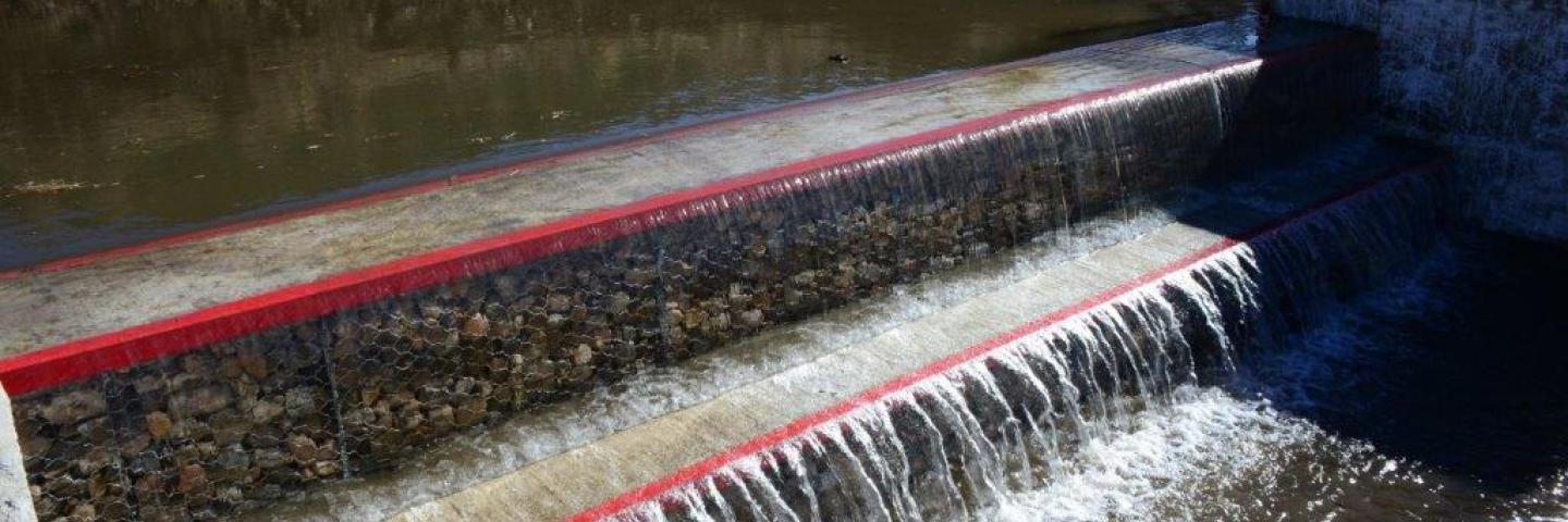 Water cascading over a water diversion