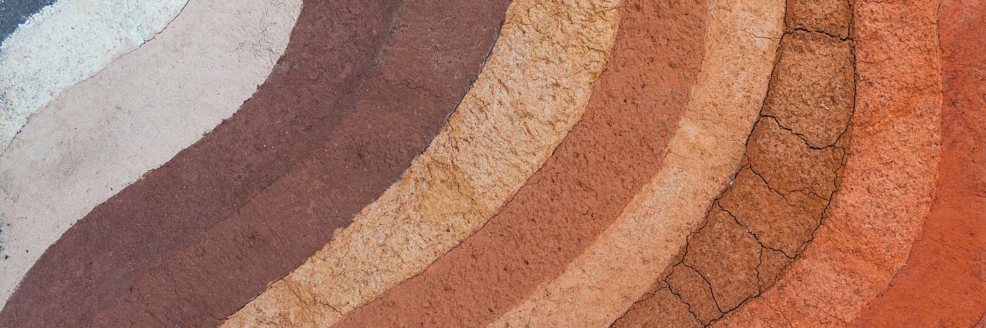 Strips of soil in varying colors.
