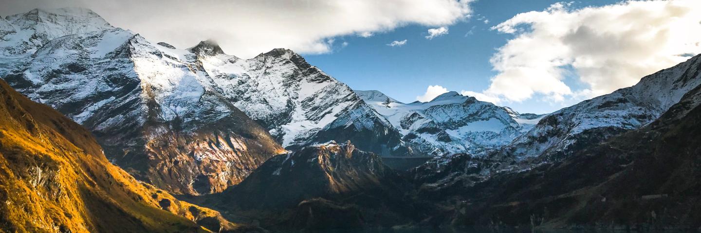 Mountain landscape with lake in foreground