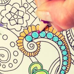 Coloring book and colored pencils.