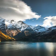 Mountain landscape with lake in foreground