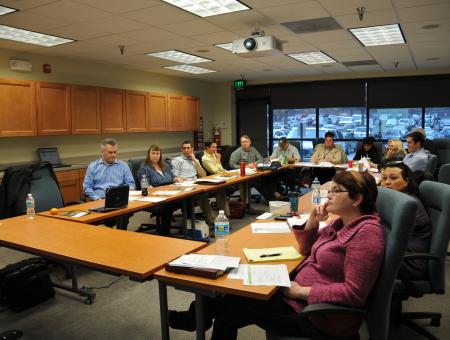 People sitting at a table in a room